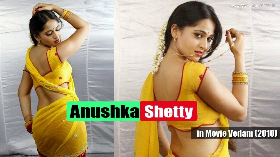 anushka hot navel in yellow saree