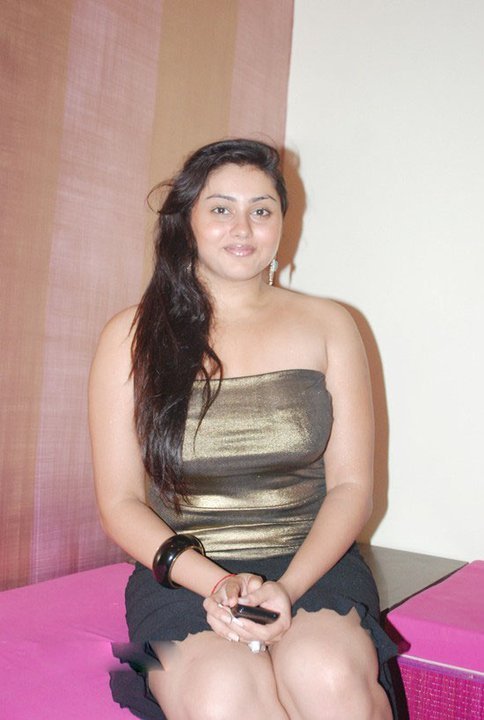 Namitha in golden tight dress